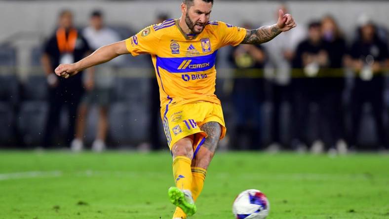 Sep 27, 2023; Los Angeles, CA, USA;  Tigres UANL forward Andre-Pierre Gignac (10) scores a penalty kick against the Los Angeles FC at BMO Stadium. Mandatory Credit: Gary A. Vasquez-USA TODAY Sports