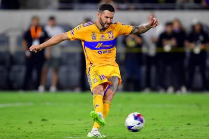 Sep 27, 2023; Los Angeles, CA, USA;  Tigres UANL forward Andre-Pierre Gignac (10) scores a penalty kick against the Los Angeles FC at BMO Stadium. Mandatory Credit: Gary A. Vasquez-USA TODAY Sports