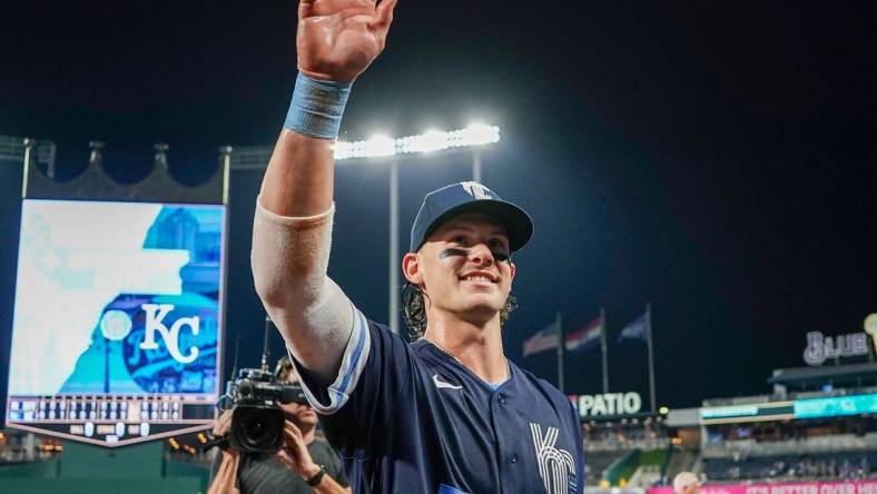 Sep 29, 2023; Kansas City, Missouri, USA;  Kansas City Royals shortstop Bobby Witt Jr. (7) waves to the crowd after the win over the New York Yankees at Kauffman Stadium. Witt became the first Royals player in history to hit 30 home runs and have 30 stolen bases. Mandatory Credit: Denny Medley-USA TODAY Sports