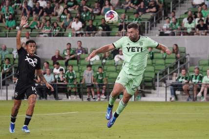 Oct 4, 2023; Austin, Texas, USA; Austin FC forward Will Bruin (29) heads the ball to score a goal against D.C. United in the first half at Q2 Stadium. Mandatory Credit: Scott Wachter-USA TODAY Sports