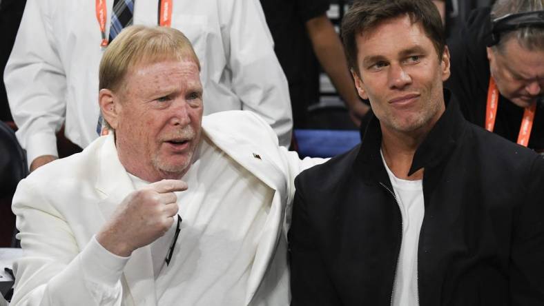 Oct 8, 2023; Las Vegas, Nevada, USA; Las Vegas Aces owner Mark Davis and part-owner Tom Brady talk before the game between the Las Vegas Aces and the New York Liberty during game one of the 2023 WNBA Finals at Michelob Ultra Arena. Mandatory Credit: Candice Ward-USA TODAY Sports