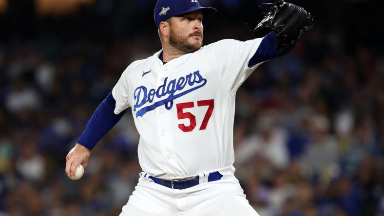 Oct 9, 2023; Los Angeles, California, USA; Los Angeles Dodgers relief pitcher Ryan Brasier (57) throws a pitch against the Arizona Diamondbacks in the fourth inning for game two of the NLDS for the 2023 MLB playoffs at Dodger Stadium. Mandatory Credit: Kiyoshi Mio-USA TODAY Sports