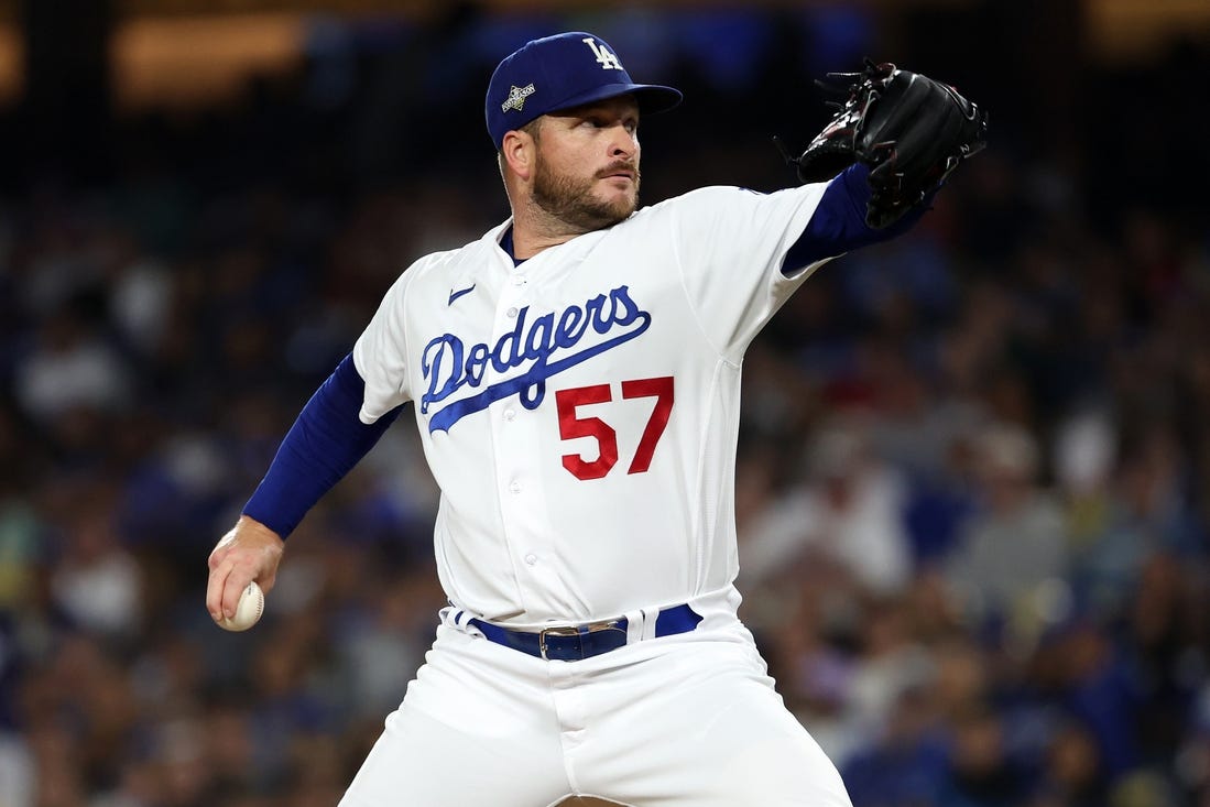 Oct 9, 2023; Los Angeles, California, USA; Los Angeles Dodgers relief pitcher Ryan Brasier (57) throws a pitch against the Arizona Diamondbacks in the fourth inning for game two of the NLDS for the 2023 MLB playoffs at Dodger Stadium. Mandatory Credit: Kiyoshi Mio-USA TODAY Sports