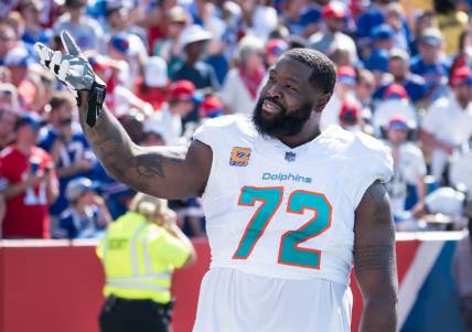 Oct 1, 2023; Orchard Park, New York, USA; Miami Dolphins offensive tackle Terron Armstead (72) reacts to the crowd before a game against the Buffalo Bills at Highmark Stadium. Mandatory Credit: Mark Konezny-USA TODAY Sports