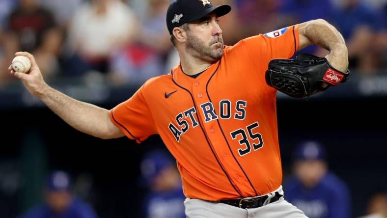 Oct 20, 2023; Arlington, Texas, USA; Houston Astros pitcher Justin Verlander (35) throws during the fifth inning of game five in the ALCS against the Texas Rangers for the 2023 MLB playoffs at Globe Life Field. Mandatory Credit: Andrew Dieb-USA TODAY Sports