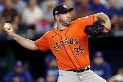 Oct 20, 2023; Arlington, Texas, USA; Houston Astros pitcher Justin Verlander (35) throws during the fifth inning of game five in the ALCS against the Texas Rangers for the 2023 MLB playoffs at Globe Life Field. Mandatory Credit: Andrew Dieb-USA TODAY Sports