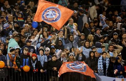 Oct 21, 2023; New York, NY, New York, NY, USA; New York City FC fans celebrate after a goal by forward Julian Fernandez (not pictured) during the second half against the Chicago Fire at Citi Field. Mandatory Credit: Vincent Carchietta-USA TODAY Sports