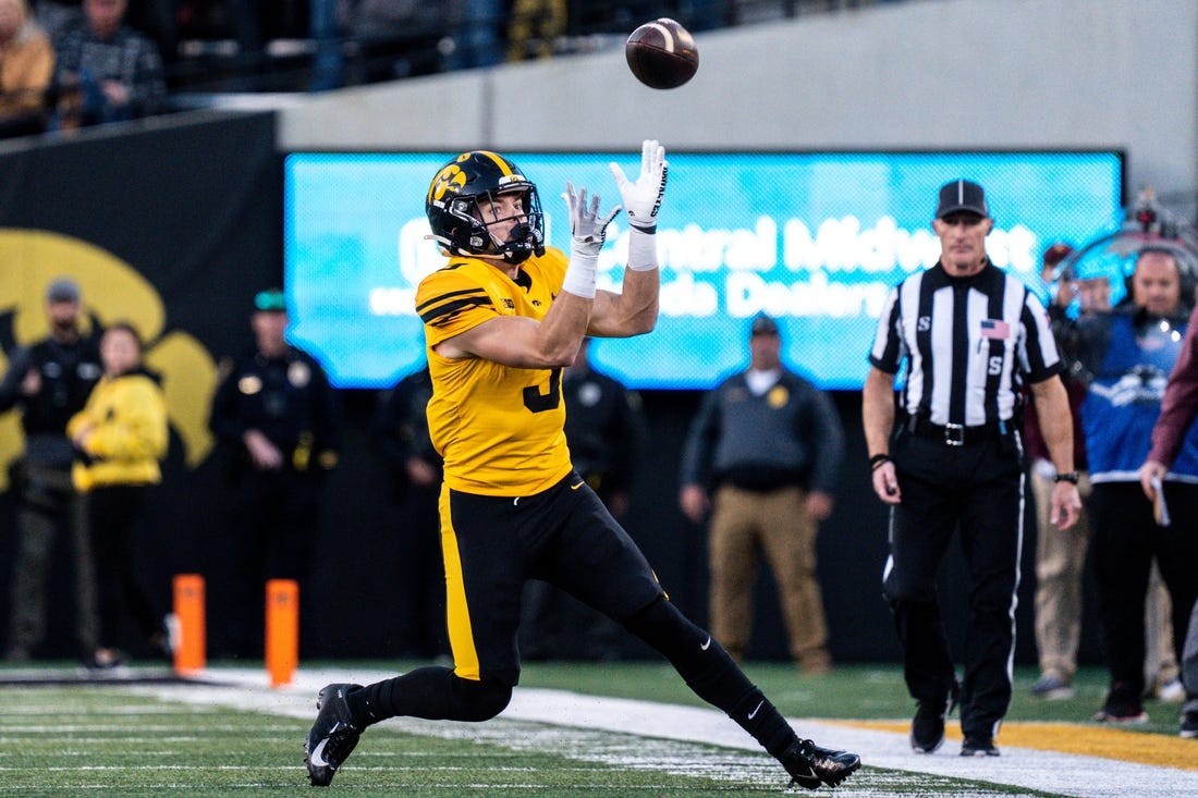 Iowa defensive back Cooper DeJean (3) catches a punt at Kinnick Stadium on Saturday, October 21, 2023 in Iowa City. DeJean returned the punt for a touchdown and it was later called back after review ruled he fair-caught the punt.