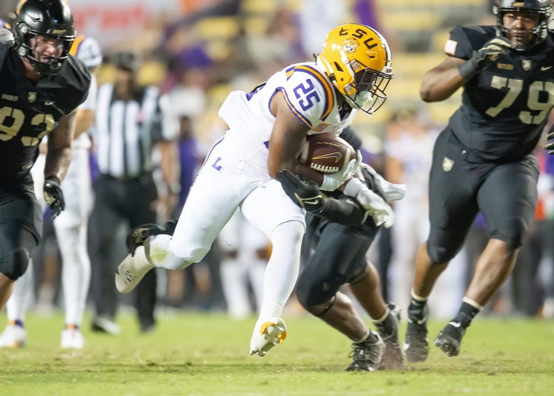 Trey Holly (25) runs the ball as the LSU Tigers take on the the Army Black Knights in Tiger Stadium in Baton Rouge, Louisiana, October. 21, 2023.