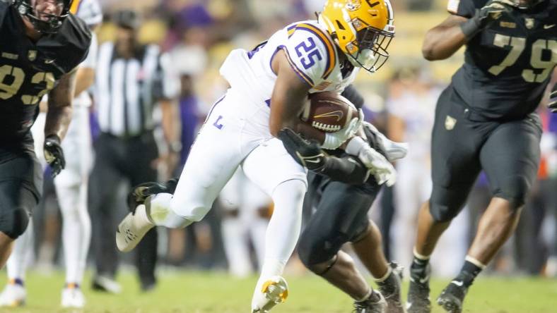 Trey Holly (25) runs the ball as the LSU Tigers take on the the Army Black Knights in Tiger Stadium in Baton Rouge, Louisiana, October. 21, 2023.