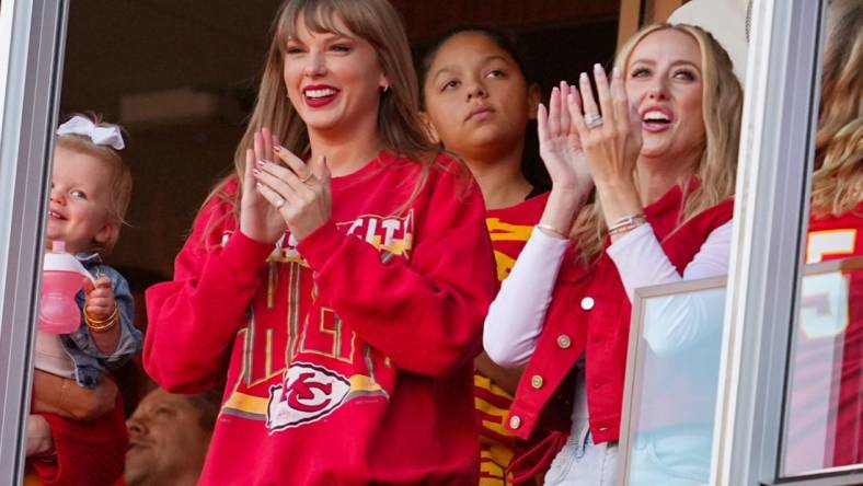 Oct 22, 2023; Kansas City, Missouri, USA; Recording artist Taylor Swift and Brittany Mahomes cheer during the second half between the Los Angeles Chargers and the Kansas City Chiefs at GEHA Field at Arrowhead Stadium. Mandatory Credit: Jay Biggerstaff-USA TODAY Sports