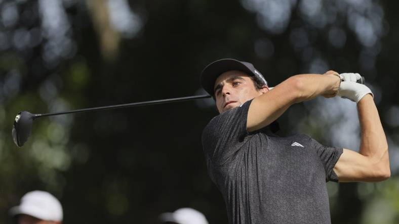 Oct 22, 2023; Doral, Florida, USA; Joaquin Niemann plays his shot from the seventh tee during the final round of the LIV Golf Miami golf tournament at Trump National Doral. Mandatory Credit: Sam Navarro-USA TODAY Sports