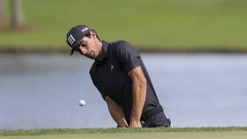 Oct 22, 2023; Doral, Florida, USA; Joaquin Niemann plays his shot on the seventh hole during the final round of the LIV Golf Miami golf tournament at Trump National Doral. Mandatory Credit: Sam Navarro-USA TODAY Sports