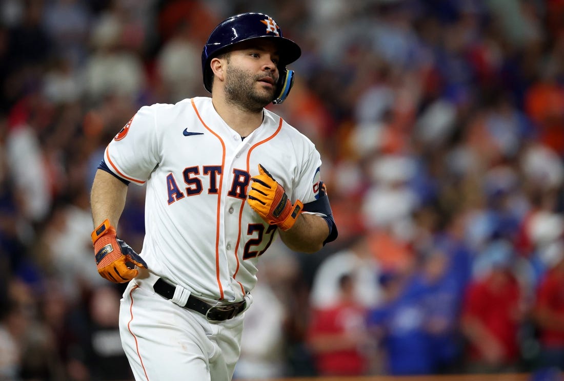 Oct 23, 2023; Houston, Texas, USA; Houston Astros second baseman Jose Altuve (27) rounds the bases after hitting a home run during the ninth inning of game seven in the ALCS against the Texas Rangers for the 2023 MLB playoffs at Minute Maid Park. Mandatory Credit: Thomas Shea-USA TODAY Sports