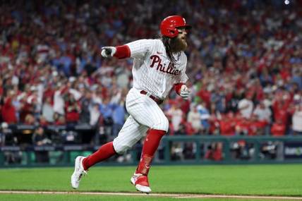 Oct 24, 2023; Philadelphia, Pennsylvania, USA; Philadelphia Phillies center fielder Brandon Marsh (16) reacts after hitting a single in the third inning for game seven of the NLCS for the 2023 MLB playoffs at Citizens Bank Park. Mandatory Credit: Bill Streicher-USA TODAY Sports