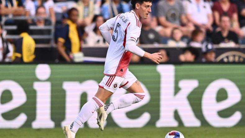 Oct 28, 2023; Philadelphia, PA, USA; New England Revolution forward Tomas Chancalay (5) controls the ball against the Philadelphia Union during the first half in game one in a round one match of the 2023 MLS Cup Playoffs at Subaru Park. Mandatory Credit: Kyle Ross-USA TODAY Sports