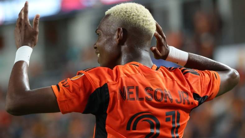 Oct 29, 2023; Houston, TX, USA; Houston Dynamo forward Nelson Quinones (21) reacts against Real Salt Lake in the second half for game one in a round one match of the 2023 MLS Cup Playoffs at Shell Energy Stadium. Mandatory Credit: Thomas Shea-USA TODAY Sports