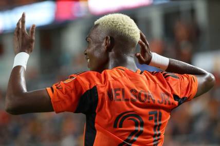Oct 29, 2023; Houston, TX, USA; Houston Dynamo forward Nelson Quinones (21) reacts against Real Salt Lake in the second half for game one in a round one match of the 2023 MLS Cup Playoffs at Shell Energy Stadium. Mandatory Credit: Thomas Shea-USA TODAY Sports