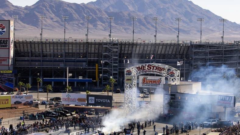 Oct 29, 2023; Las Vegas, NV, USA; Overall view of The Strip at Las Vegas Motor Speedway as NHRA top fuel driver Steve Torrence does a burnout during the Nevada Nationals. Mandatory Credit: Mark J. Rebilas-USA TODAY Sports