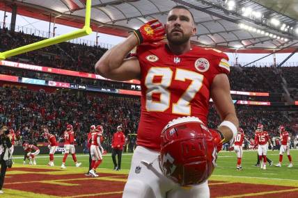 Nov 5, 2023; Frankfurt, Germany, ;  Kansas City Chiefs tight end Travis Kelce (87) reacts to fans before an NFL International Series game against the Miami Dolphins at Deutsche Bank Park. Mandatory Credit: Nathan Ray Seebeck-USA TODAY Sports