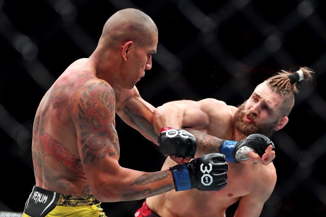 Nov 11, 2023; New York, NY, USA; Jiri Prochazka (red gloves) fights Alex Pereira (blue gloves) during UFC 295 at Madison Square Garden. Mandatory Credit: Wendell Cruz-USA TODAY Sports