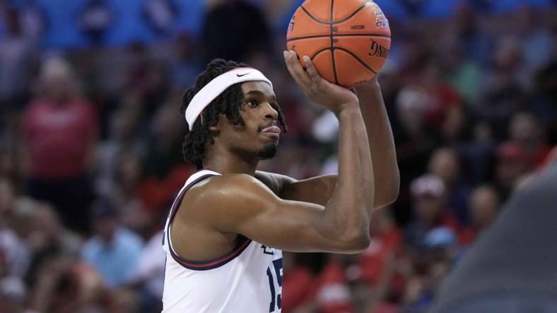 Nov 17, 2023; Charleston, SC, USA; Dayton Flyers forward DaRon Holmes II (15) shoots a foul shot in the second half against the St. John's Red Storm at TD Arena. Mandatory Credit: David Yeazell-USA TODAY Sports