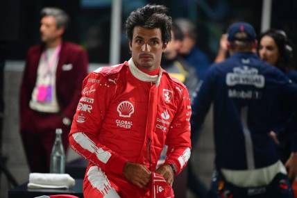 Nov 17, 2023; Las Vegas, Nevada, USA; Scuderia Ferrari driver Carlos Sainz Jr. of Spain (55) reacts after qualifying second at Las Vegas Strip Circuit. Mandatory Credit: Gary A. Vasquez-USA TODAY Sports