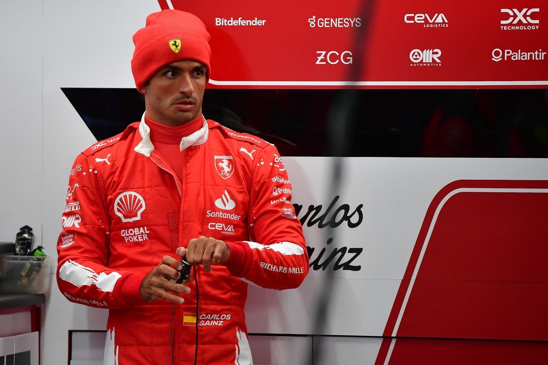 Nov 17, 2023; Las Vegas, Nevada, USA; Scuderia Ferrari driver Carlos Sainz Jr. of Spain (55) before free practice at Las Vegas Strip Circuit. Mandatory Credit: Gary A. Vasquez-USA TODAY Sports