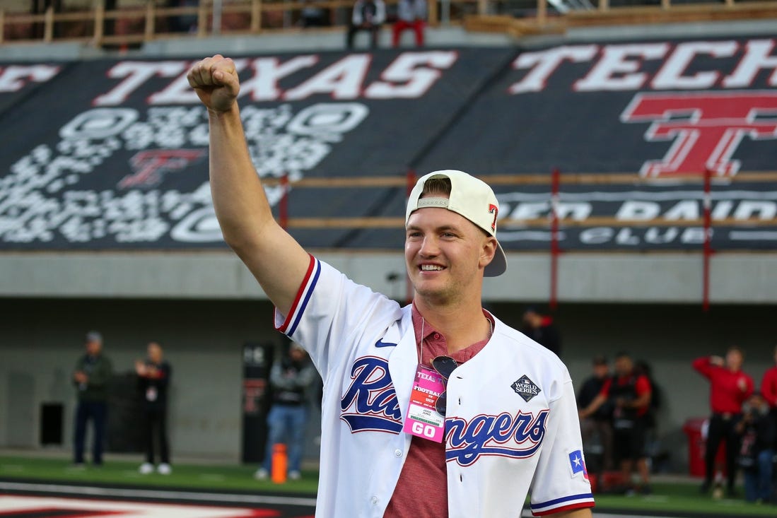 Nov 18, 2023; Lubbock, Texas, USA;  Texas Rangers and Texas Tech Red Raiders alumnus Josh Jung is introduced in the second half during the game against the Central Florida Knights at Jones AT&T Stadium and Cody Campbell Field. Mandatory Credit: Michael C. Johnson-USA TODAY Sports