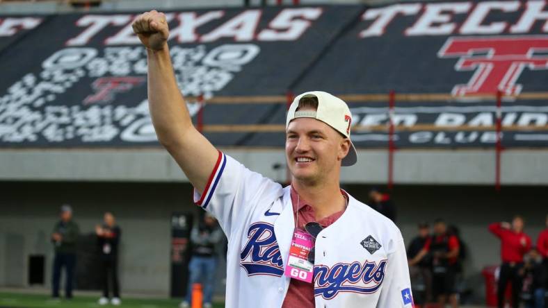 Nov 18, 2023; Lubbock, Texas, USA;  Texas Rangers and Texas Tech Red Raiders alumnus Josh Jung is introduced in the second half during the game against the Central Florida Knights at Jones AT&T Stadium and Cody Campbell Field. Mandatory Credit: Michael C. Johnson-USA TODAY Sports