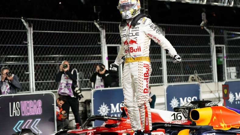 Nov 18, 2023; Las Vegas, Nevada, USA; Red Bull Racing Honda driver Max Verstappen of Netherlands (1) celebrates after winning the Formula 1 Heineken Silver Las Vegas Grand Prix at the Las Vegas Strip Circuit. Mandatory Credit: Lucas Peltier-USA TODAY Sports