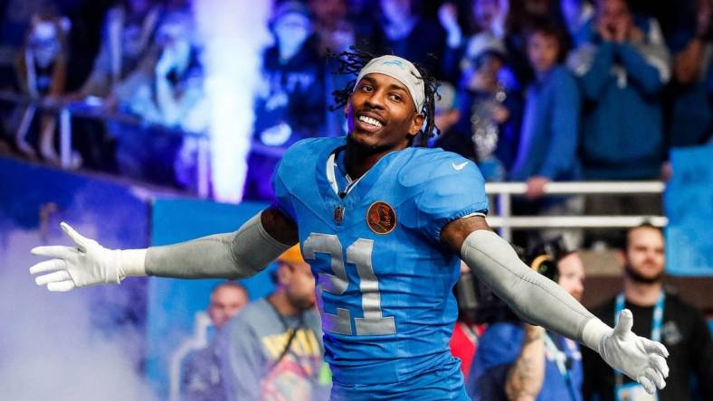 Detroit Lions safety Tracy Walker III (21) is being introduced before the Green Bay Packers game at Ford Field in Detroit on Thursday, Nov. 23, 2023.