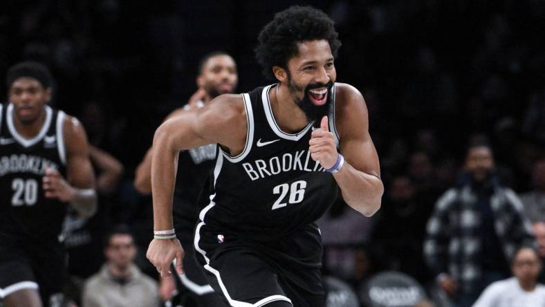 Nov 26, 2023; Brooklyn, New York, USA; Brooklyn Nets guard Spencer Dinwiddie (26) reacts after scoring a basket against the Chicago Bulls during the fourth quarter at Barclays Center. Mandatory Credit: John Jones-USA TODAY Sports