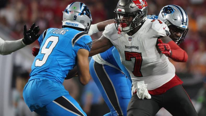 Dec 3, 2023; Tampa, Florida, USA; Tampa Bay Buccaneers linebacker Shaquil Barrett (7) rushes Carolina Panthers quarterback Bryce Young (9) during the second half at Raymond James Stadium. Mandatory Credit: Kim Klement Neitzel-USA TODAY Sports