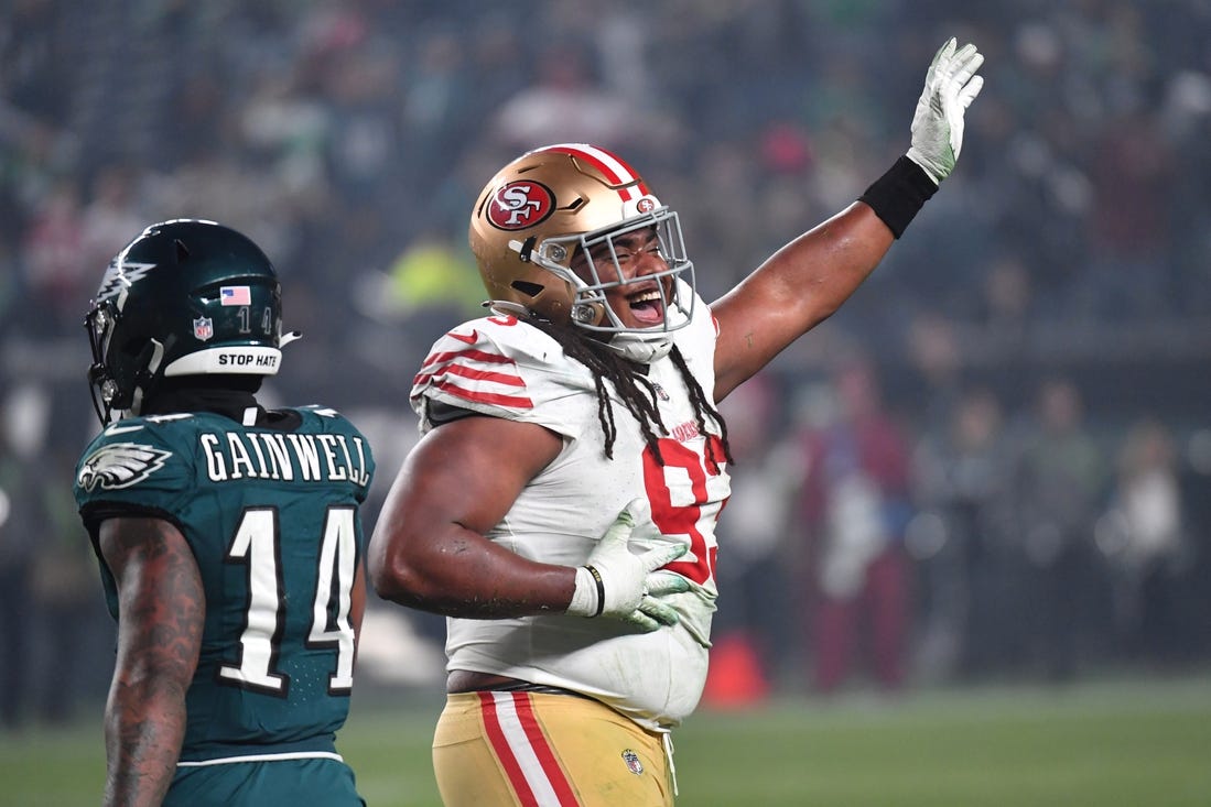 Dec 3, 2023; Philadelphia, Pennsylvania, USA; San Francisco 49ers defensive tackle Kalia Davis (93) celebrates his sack against the Philadelphia Eagles during the fourth quarter at Lincoln Financial Field. Mandatory Credit: Eric Hartline-USA TODAY Sports