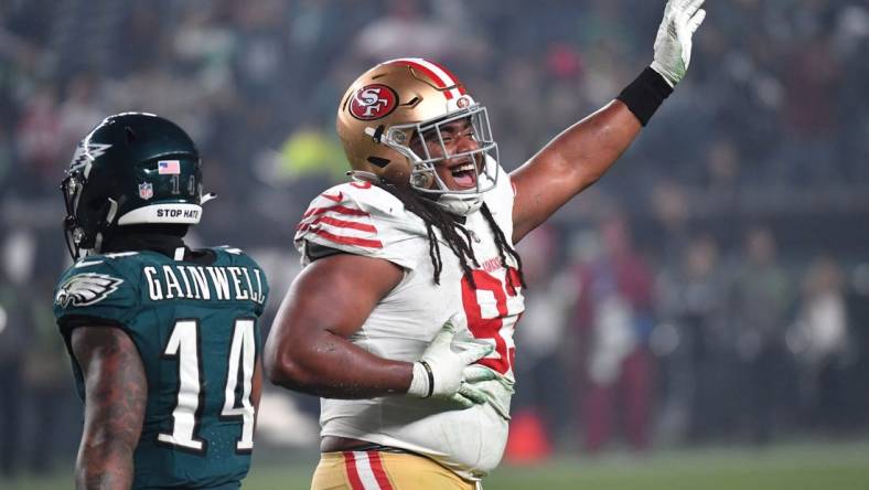 Dec 3, 2023; Philadelphia, Pennsylvania, USA; San Francisco 49ers defensive tackle Kalia Davis (93) celebrates his sack against the Philadelphia Eagles during the fourth quarter at Lincoln Financial Field. Mandatory Credit: Eric Hartline-USA TODAY Sports