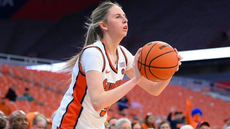 Nov 30, 2023; Syracuse, New York, USA; Syracuse Orange guard Georgia Woolley (5) shoots the ball against the Alabama Crimson Tide during the first half at the JMA Wireless Dome. Mandatory Credit: Rich Barnes-USA TODAY Sports