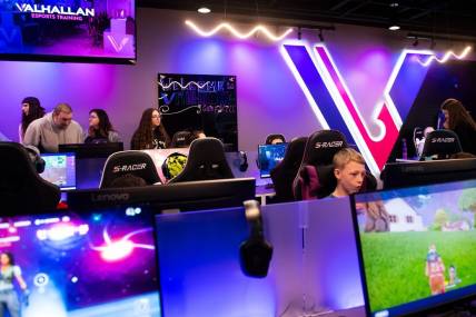 Young gamers play on PCs during a pre-grand opening event at Valhallan Esports Training on Thursday, Nov. 30, 2023, in Camp Hill.