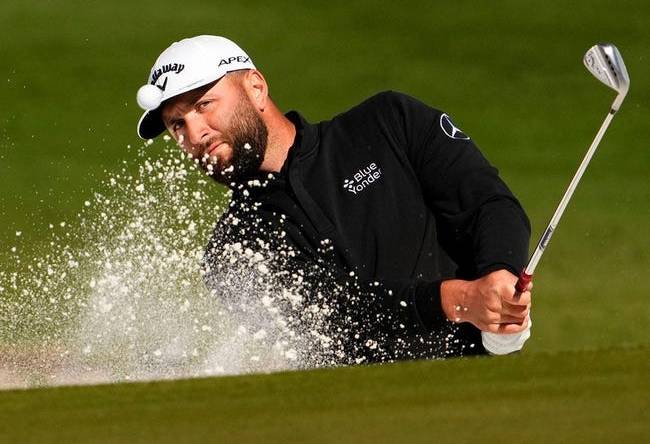 Jon Rahm makes an eagle-3 from a green side bunker on the 15th hole during round two of the WM Phoenix Open at TPC Scottsdale on Feb 10, 2023.