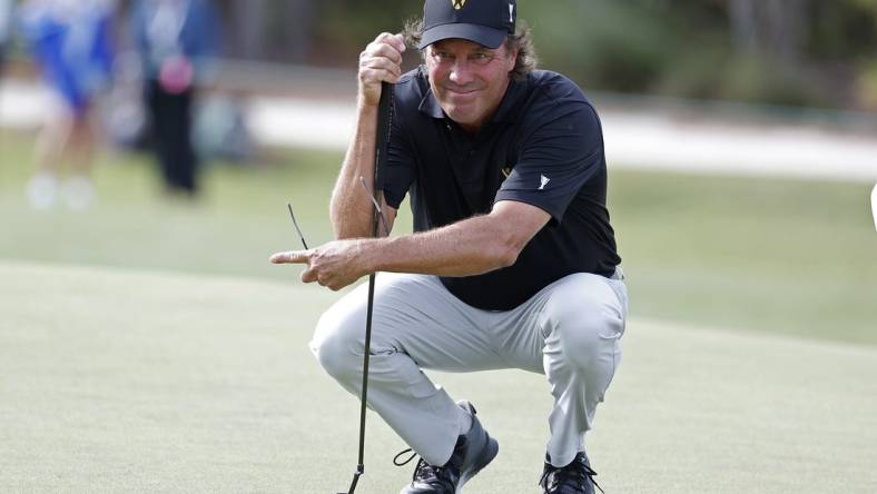 Dec 8, 2023; Bradenton, Florida, USA; Team International s Stephen Ames lines up a putt during their morning round at The Concession Golf Club. Mandatory Credit: Jeff Swinger-USA TODAY Sports