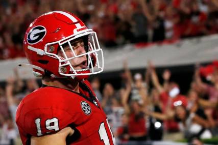 Georgia tight end Brock Bowers (19) celebrates after scoring a touchdown during the first half of a NCAA college football game against UAB in Athens, Ga., on Saturday, Sept. 23, 2023.