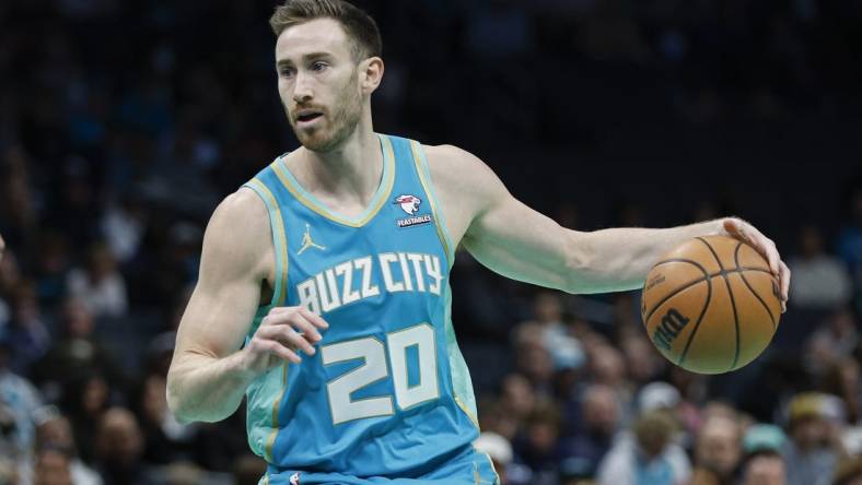 Dec 15, 2023; Charlotte, North Carolina, USA; Charlotte Hornets forward Gordon Hayward (20) runs the offense against the New Orleans Pelicans during the first quarter at Spectrum Center. Mandatory Credit: Nell Redmond-USA TODAY Sports