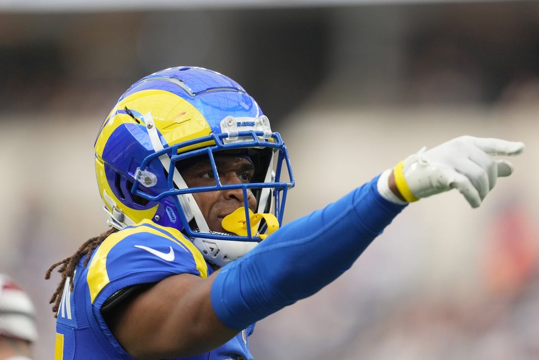 Dec 17, 2023; Inglewood, California, USA; Los Angeles Rams wide receiver Demarcus Robinson (15) gestures after a first down against the Washington Commanders in the first half at SoFi Stadium. Mandatory Credit: Kirby Lee-USA TODAY Sports