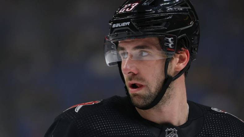 Dec 19, 2023; Buffalo, New York, USA;  Buffalo Sabres defenseman Mattias Samuelsson (23) during a stoppage in play against the Columbus Blue Jackets during the first period at KeyBank Center. Mandatory Credit: Timothy T. Ludwig-USA TODAY Sports