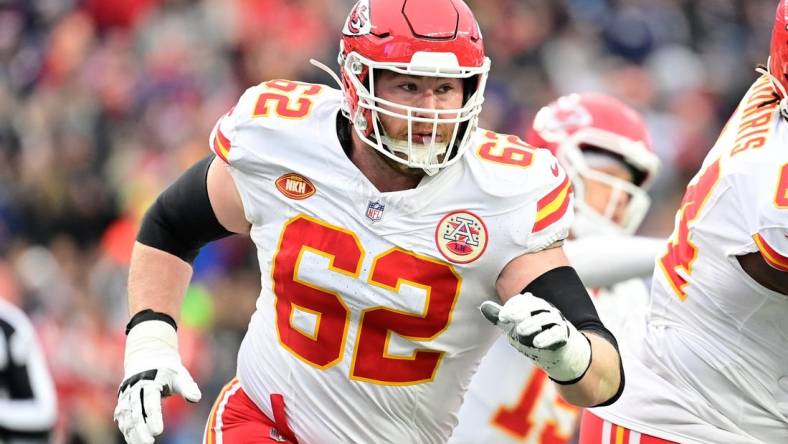 Dec 17, 2023; Foxborough, Massachusetts, USA; Kansas City Chiefs guard Joe Thuney (62)  in action during the first half against the New England Patriots at Gillette Stadium. Mandatory Credit: Eric Canha-USA TODAY Sports