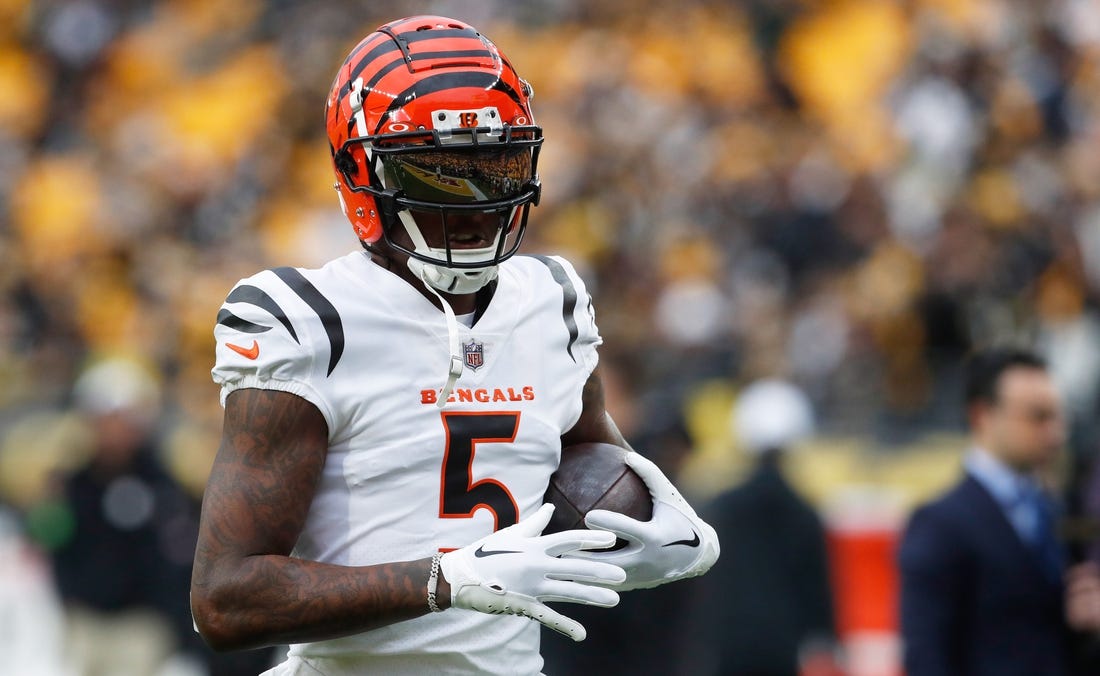 Dec 23, 2023; Pittsburgh, Pennsylvania, USA;  Cincinnati Bengals wide receiver Tee Higgins (5) warms up before the game against the Pittsburgh Steelers at Acrisure Stadium. Mandatory Credit: Charles LeClaire-USA TODAY Sports