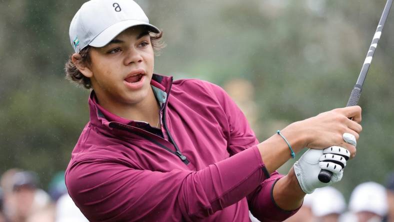 Dec 17, 2023; Orlando, Florida, USA;  Charlie Woods plays his shot from the first tee during the PNC Championship at The Ritz-Carlton Golf Club. Mandatory Credit: Reinhold Matay-USA TODAY Sports