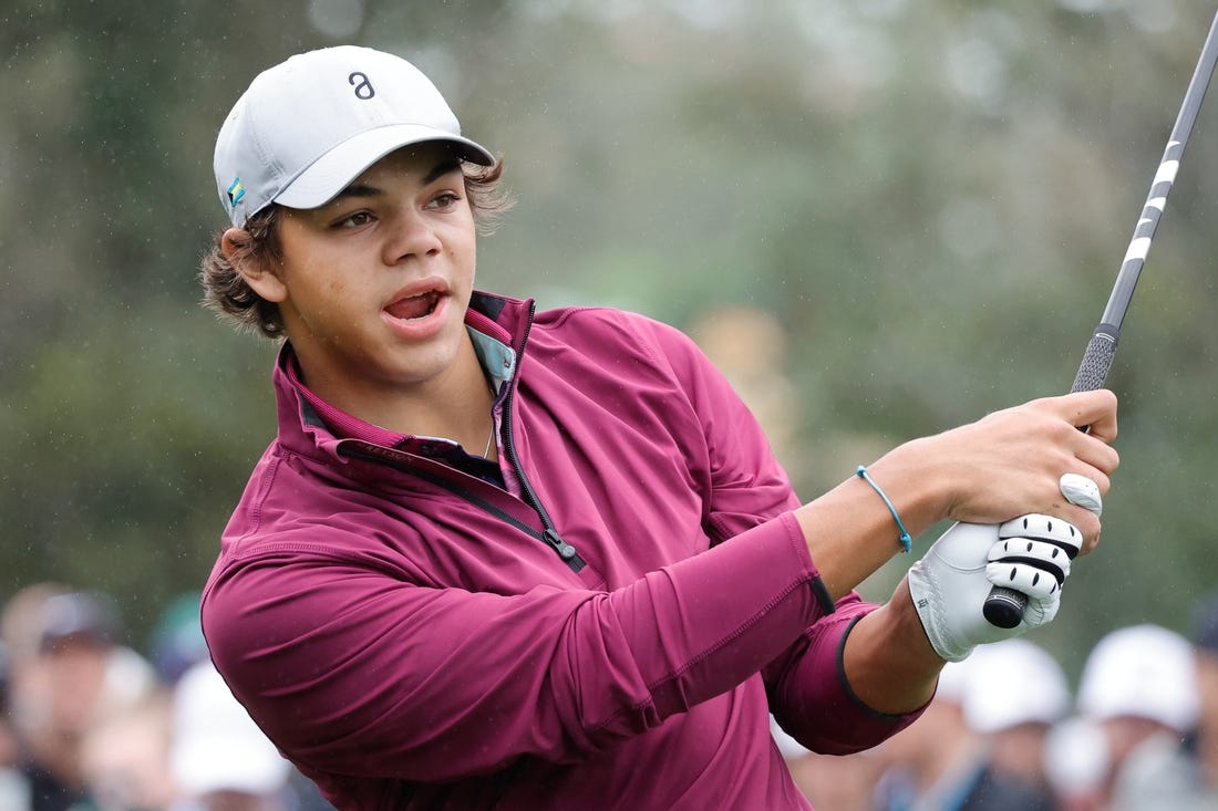 Dec 17, 2023; Orlando, Florida, USA;  Charlie Woods plays his shot from the first tee during the PNC Championship at The Ritz-Carlton Golf Club. Mandatory Credit: Reinhold Matay-USA TODAY Sports