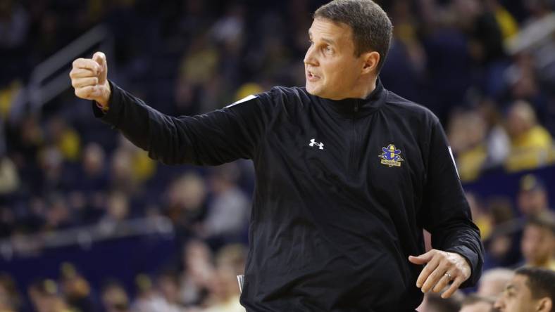 Dec 29, 2023; Ann Arbor, Michigan, USA;  McNeese State Cowboys head coach Will Wade coaches during the first half against the Michigan Wolverines at Crisler Center. Mandatory Credit: Rick Osentoski-USA TODAY Sports