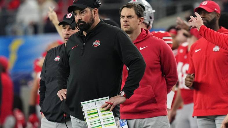 Dec 29, 2023; Arlington, Texas, USA; Ohio State Buckeyes head coach Ryan Day watches during the second quarter of the Goodyear Cotton Bowl Classic against the Missouri Tigers at AT&T Stadium.